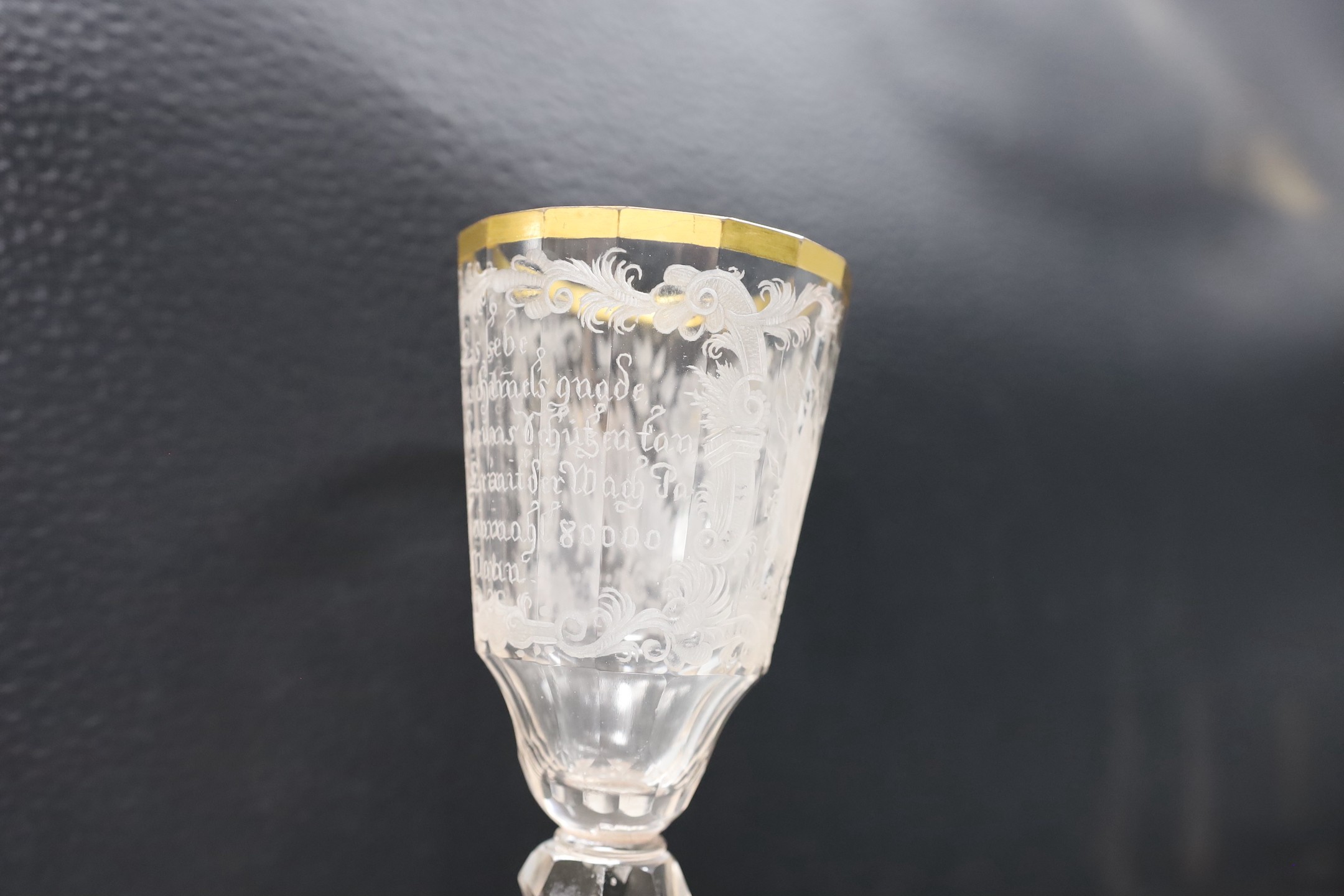 A mid 18th century German/Bohemian glass with military engraving, 17cms high